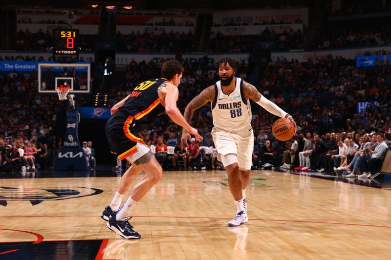 OKLAHOMA CITY, OK - APRIL 14: Markieff Morris #88 of the Dallas Mavericks dribbles the ball during the game against the Oklahoma City Thunder on April 14, 2024 at Paycom Arena in Oklahoma City, Oklahoma. NOTE TO USER: User expressly acknowledges and agrees that, by downloading and or using this photograph, User is consenting to the terms and conditions of the Getty Images License Agreement. Mandatory Copyright Notice: Copyright 2024 NBAE (Photo by Zach Beeker/NBAE via Getty Images)