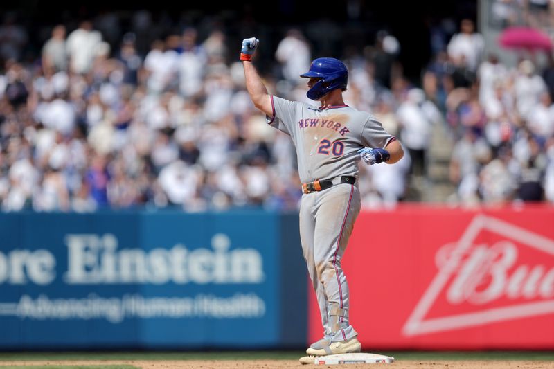 May 17, 2025; Bronx, New York, USA; New York Mets first baseman Pete Alonso (20) reacts after hitting a double against the New York Yankees during the eighth inning at Yankee Stadium. Mandatory Credit: Brad Penner-Imagn Images