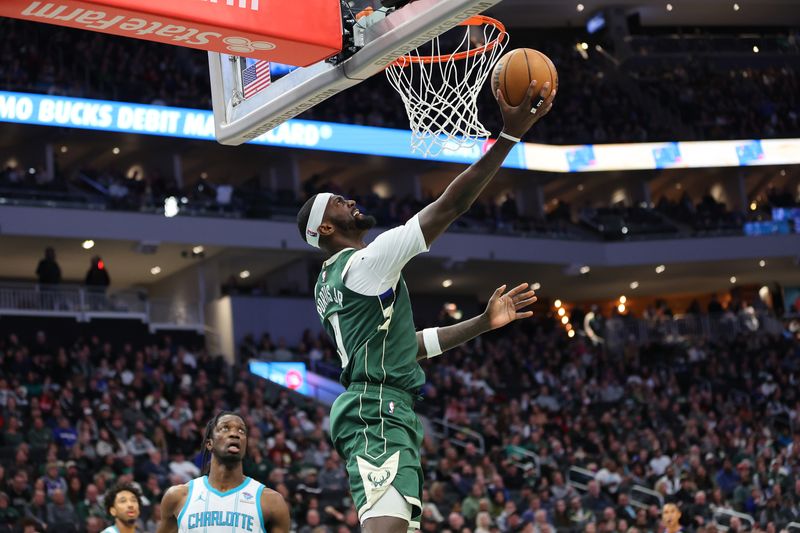 MILWAUKEE, WISCONSIN - FEBRUARY 09: Bobby Portis #9 of the Milwaukee Bucks drives to the basket during a game against the Charlotte Hornets at Fiserv Forum on February 09, 2024 in Milwaukee, Wisconsin. NOTE TO USER: User expressly acknowledges and agrees that, by downloading and or using this photograph, User is consenting to the terms and conditions of the Getty Images License Agreement. (Photo by Stacy Revere/Getty Images)