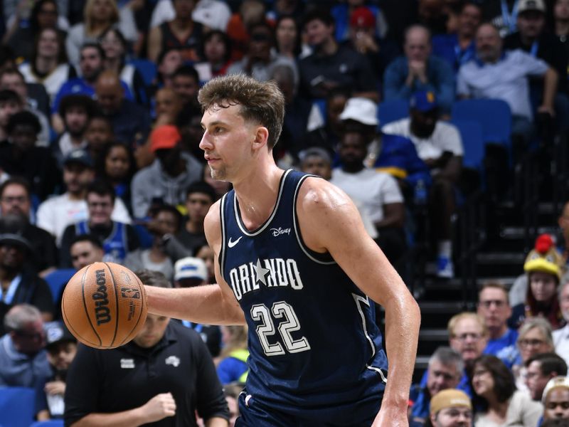 ORLANDO, FL - MARCH 21: Franz Wagner #22 of the Orlando Magic dribbles the ball during the game against the New Orleans Pelicans on March 21, 2024 at Amway Center in Orlando, Florida. NOTE TO USER: User expressly acknowledges and agrees that, by downloading and or using this photograph, User is consenting to the terms and conditions of the Getty Images License Agreement. Mandatory Copyright Notice: Copyright 2024 NBAE (Photo by Fernando Medina/NBAE via Getty Images)