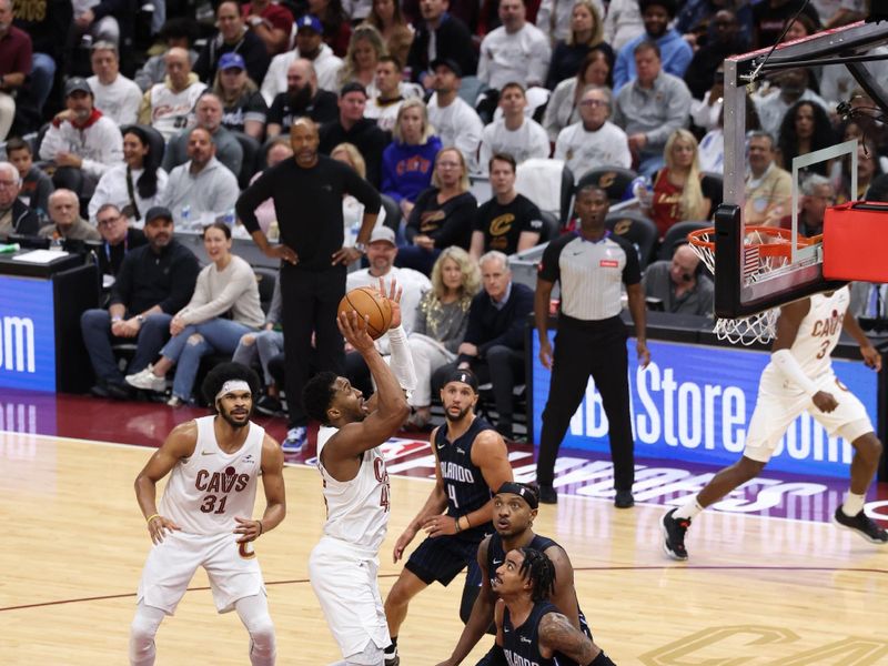 CLEVELAND, OH - APRIL 20: Donovan Mitchell #45 of the Cleveland Cavaliers shoots the ball during Round One Game One of the 2024 NBA Playoffs against the Orlando Magic on April 20, 2024 at Rocket Mortgage FieldHouse in Cleveland, Ohio. NOTE TO USER: User expressly acknowledges and agrees that, by downloading and/or using this Photograph, user is consenting to the terms and conditions of the Getty Images License Agreement. Mandatory Copyright Notice: Copyright 2024 NBAE (Photo by  Lauren Leigh Bacho/NBAE via Getty Images)