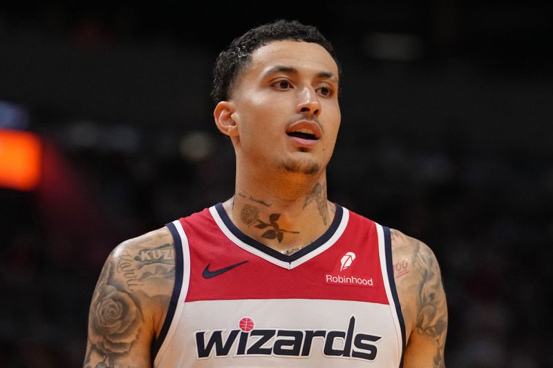 MIAMI, FL - MARCH 10: Kyle Kuzma #33 of the Washington Wizards looks on during the game against the Miami Heat on March 10, 2024 at Kaseya Center in Miami, Florida. NOTE TO USER: User expressly acknowledges and agrees that, by downloading and or using this Photograph, user is consenting to the terms and conditions of the Getty Images License Agreement. Mandatory Copyright Notice: Copyright 2024 NBAE (Photo by Eric Espada/NBAE via Getty Images)