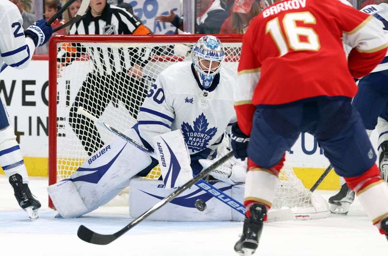 May 11, 2025; Sunrise, Florida, USA; Toronto Maple Leafs goaltender Joseph Woll (60) makes a save against the Florida Panthers during the second period in game four of the second round of the 2025 Stanley Cup Playoffs at Amerant Bank Arena. Mandatory Credit: Kim Klement Neitzel-Imagn Images