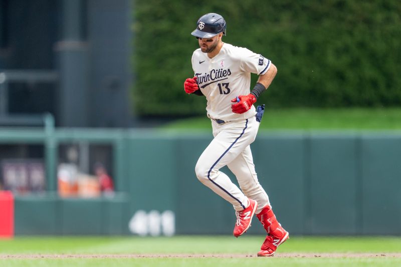 May 14, 2023; Minneapolis, Minnesota, USA; Minnesota Twins first baseman Joey Gallo (13) rounds second after hitting a home run off Chicago Cubs starting pitcher Marcus Stroman (0) in the third inning at Target Field. Mandatory Credit: Matt Blewett-USA TODAY Sports