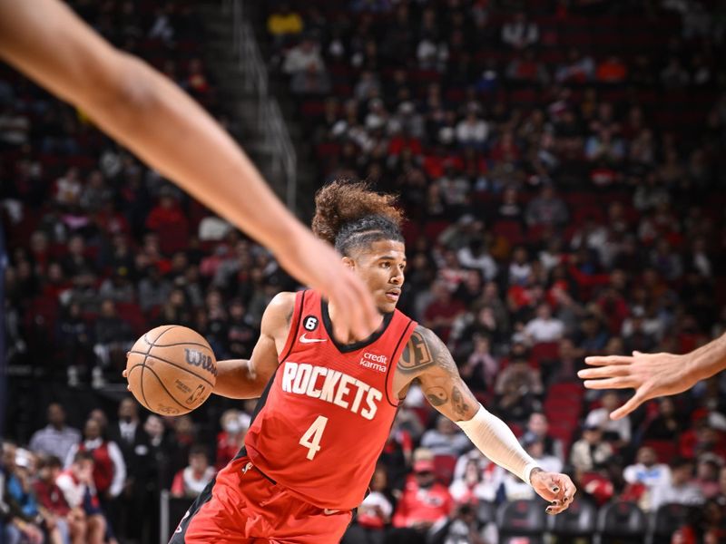 HOUSTON, TX - JANUARY 23:   Jalen Green #4 of the Houston Rockets drives to the basket during the game against the Minnesota Timberwolves on January 23, 2023 at the Toyota Center in Houston, Texas. NOTE TO USER: User expressly acknowledges and agrees that, by downloading and or using this photograph, User is consenting to the terms and conditions of the Getty Images License Agreement. Mandatory Copyright Notice: Copyright 2023 NBAE (Photo by Logan Riely/NBAE via Getty Images)