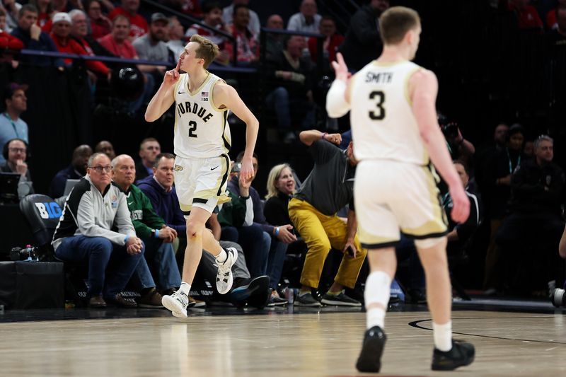 Mar 15, 2024; Minneapolis, MN, USA; Purdue Boilermakers guard Fletcher Loyer (2) gestures to the crowd after his three-point basket against the Michigan State Spartans during the second half at Target Center. Mandatory Credit: Matt Krohn-USA TODAY Sports