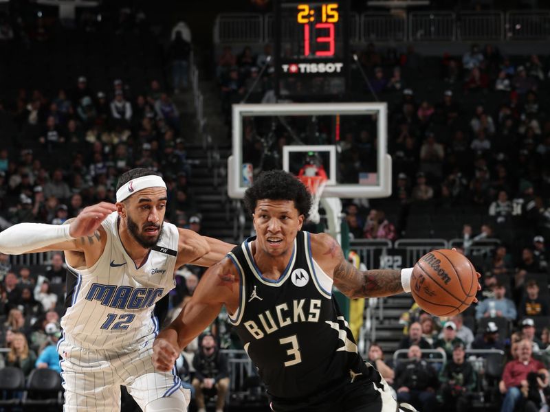 MILWAUKEE, WI - JANUARY 15:  MarJon Beauchamp #3 of the Milwaukee Bucks handles the ball during the game against the Orlando Magic on January 15, 2025 at Fiserv Forum Center in Milwaukee, Wisconsin. NOTE TO USER: User expressly acknowledges and agrees that, by downloading and or using this Photograph, user is consenting to the terms and conditions of the Getty Images License Agreement. Mandatory Copyright Notice: Copyright 2025 NBAE (Photo by Gary Dineen/NBAE via Getty Images).