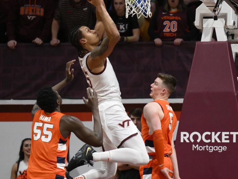 Jan 28, 2023; Blacksburg, Virginia, USA; Virginia Tech Hokies center Lynn Kidd (15) drives to the basket as Syracuse Orange center Mounir Hima (55) and Syracuse Orange guard Justin Taylor (5) defend in the first half at Cassell Coliseum. Mandatory Credit: Lee Luther Jr.-USA TODAY Sports