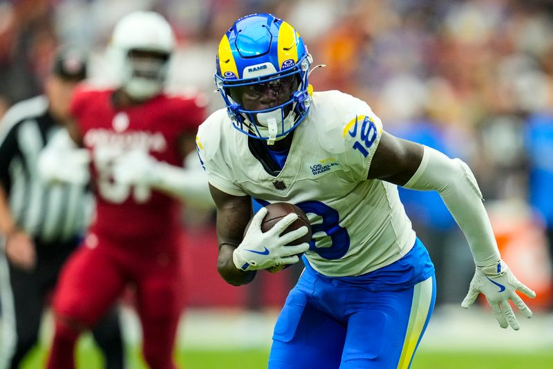 Los Angeles Rams wide receiver Tyler Johnson (18) runs against the Arizona Cardinals during the first half of an NFL football game, Sunday, Sept. 15, 2024, in Glendale, Ariz. (AP Photo/Ross D. Franklin)