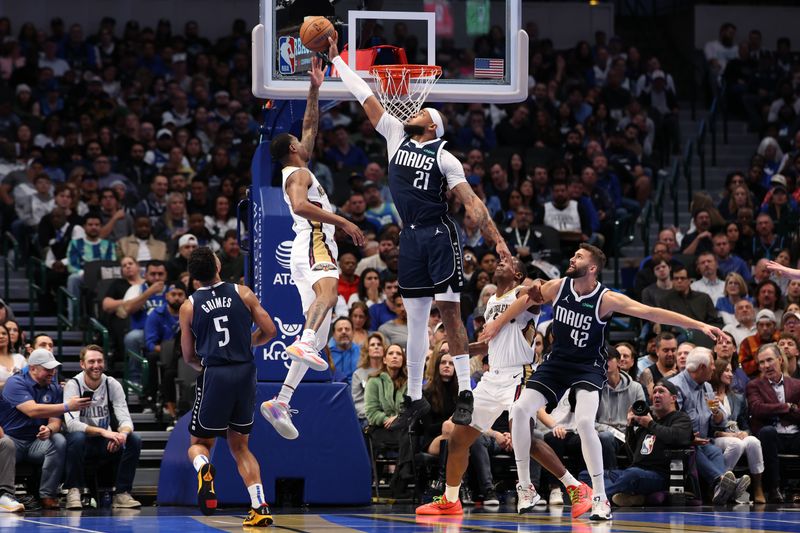 DALLAS, TEXAS - NOVEMBER 19: Daniel Gafford #21 of the Dallas Mavericks blocks a shot from Jamal Cain #8 of the New Orleans Pelicans during the first half of an Emirates NBA Cup game at American Airlines Center on November 19, 2024 in Dallas, Texas. NOTE TO USER: User expressly acknowledges and agrees that, by downloading and/or using this photograph, user is consenting to the terms and conditions of the Getty Images License Agreement. (Photo by Sam Hodde/Getty Images)