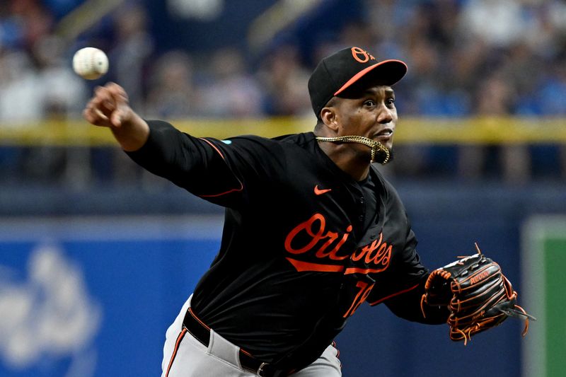 Aug 9, 2024; St. Petersburg, Florida, USA; Baltimore Orioles relief pitcher Yennier Cano (78) throws a pitch in the ninth inning against the Tampa Bay Rays at Tropicana Field. Mandatory Credit: Jonathan Dyer-USA TODAY Sports