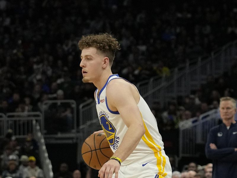 MILWAUKEE, WISCONSIN - JANUARY 13: Brandin Podziemski #2 of the Golden State Warriors dribbles the ball in the first half against the Milwaukee Bucks at Fiserv Forum on January 13, 2024 in Milwaukee, Wisconsin. NOTE TO USER: User expressly acknowledges and agrees that, by downloading and or using this photograph, User is consenting to the terms and conditions of the Getty Images License Agreement. (Photo by Patrick McDermott/Getty Images)