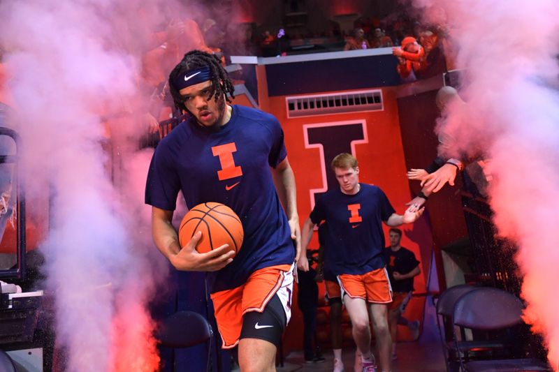 Feb 24, 2024; Champaign, Illinois, USA;  Illinois Fighting Illini forward Ty Rodgers (20) leads players to the court before the start of a game with the Iowa Hawkeyes at State Farm Center. Mandatory Credit: Ron Johnson-USA TODAY Sports