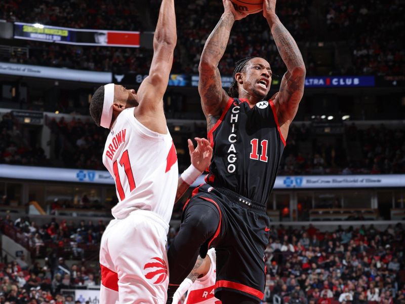 CHICAGO, IL - JANUARY 30: DeMar DeRozan #11 of the Chicago Bulls handles the ball during the game against the Toronto Raptors on January 30, 2024 at United Center in Chicago, Illinois. NOTE TO USER: User expressly acknowledges and agrees that, by downloading and or using this photograph, User is consenting to the terms and conditions of the Getty Images License Agreement. Mandatory Copyright Notice: Copyright 2024 NBAE (Photo by Jeff Haynes/NBAE via Getty Images)