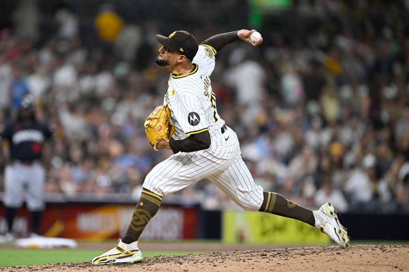 Aug 19, 2024; San Diego, California, USA; San Diego Padres relief pitcher Robert Suarez (75) pitches during the ninth inning against the Minnesota Twins at Petco Park. Mandatory Credit: Denis Poroy-USA TODAY Sports