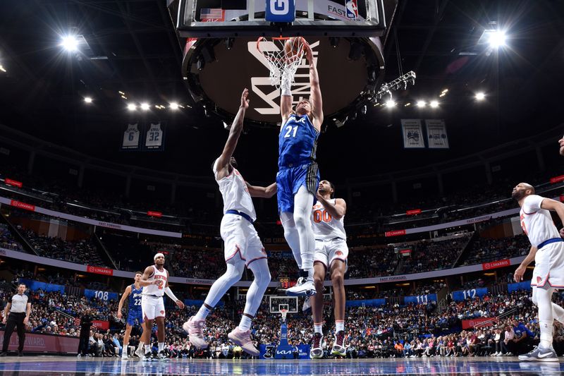 ORLANDO, FL - FEBRUARY 14: Moritz Wagner #21 of the Orlando Magic drives to the basket during the game against the New York Knicks on February 14, 2024 at the Kia Center in Orlando, Florida. NOTE TO USER: User expressly acknowledges and agrees that, by downloading and or using this photograph, User is consenting to the terms and conditions of the Getty Images License Agreement. Mandatory Copyright Notice: Copyright 2024 NBAE (Photo by Fernando Medina/NBAE via Getty Images)