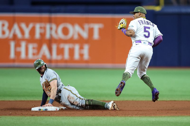 May 19, 2023; St. Petersburg, Florida, USA;  Milwaukee Brewers second baseman Owen Miller (6) steals second base against the Tampa Bay Rays in the eighth inning at Tropicana Field. Mandatory Credit: Nathan Ray Seebeck-USA TODAY Sports