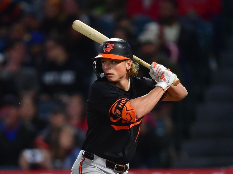 Apr 23, 2024; Anaheim, California, USA; Baltimore Orioles second baseman Jackson Holliday (7) hits against the Los Angeles Angels during the seventh inning at Angel Stadium. Mandatory Credit: Gary A. Vasquez-USA TODAY Sports