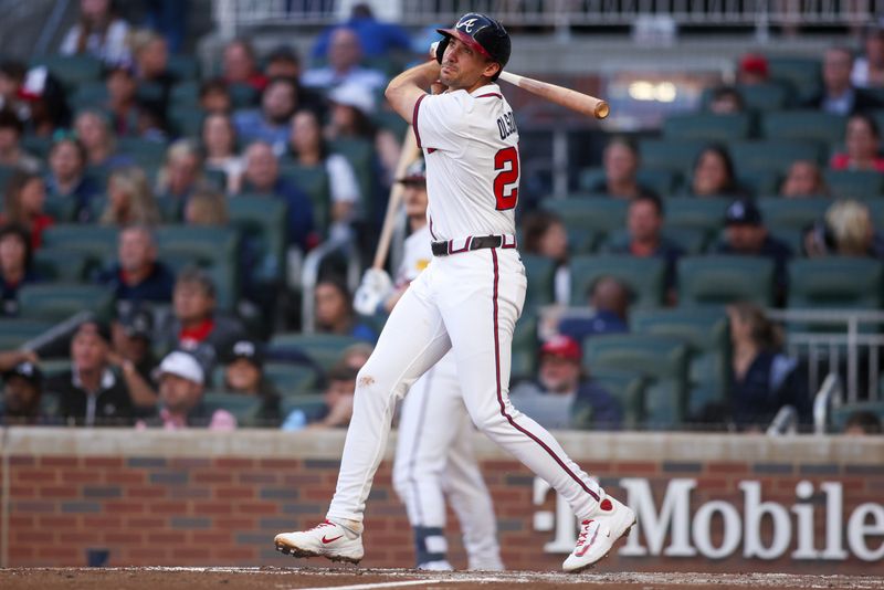 May 5, 2025; Atlanta, Georgia, USA; Atlanta Braves first baseman Matt Olson (28) hits an inside-the-park home run against the Cincinnati Reds in the third inning at Truist Park. Mandatory Credit: Brett Davis-Imagn Images