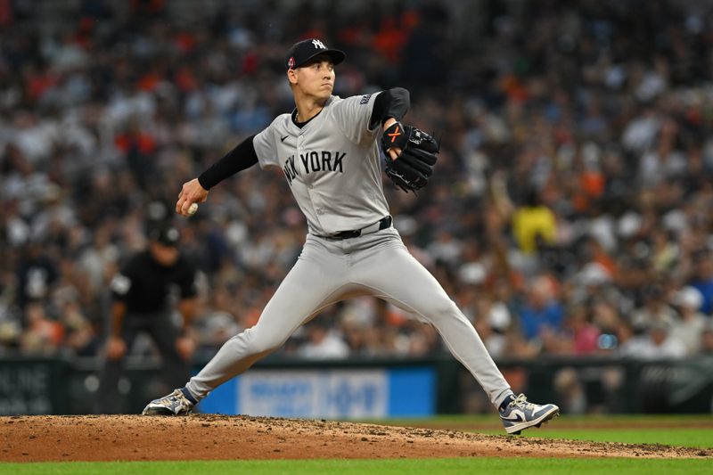 Aug 16, 2024; Detroit, Michigan, USA;  New York Yankees pitcher Luke Weaver (30) throws a pitch against the Detroit Tigers in the seventh inning at Comerica Park. Mandatory Credit: Lon Horwedel-USA TODAY Sports