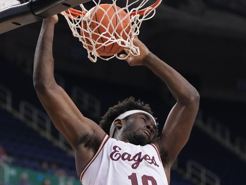 Mar 7, 2023; Greensboro, NC, USA; Boston College Eagles guard Prince Aligbe (10) scores in the second half of the first round of the ACC Tournament at Greensboro Coliseum. Mandatory Credit: Bob Donnan-USA TODAY Sports