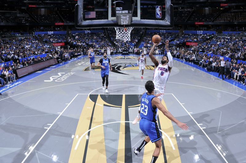 ORLANDO, FL - NOVEMBER 15: Paul George #8 of the Philadelphia 76ers shoots the ball during the game against the Orlando Magic during the Emirates NBA Cup game on  November 15, 2024 at Kia Center in Orlando, Florida. NOTE TO USER: User expressly acknowledges and agrees that, by downloading and or using this photograph, User is consenting to the terms and conditions of the Getty Images License Agreement. Mandatory Copyright Notice: Copyright 2024 NBAE (Photo by Fernando Medina/NBAE via Getty Images)