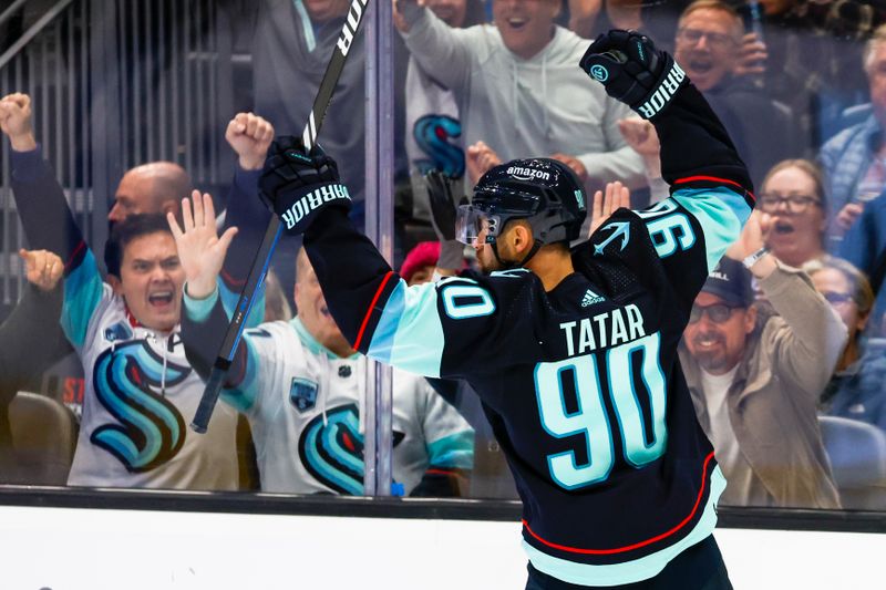 Jan 4, 2024; Seattle, Washington, USA; Seattle Kraken left wing Tomas Tatar (90) celebrates after scoring a goal against the Ottawa Senators during the second period at Climate Pledge Arena. Mandatory Credit: Joe Nicholson-USA TODAY Sports