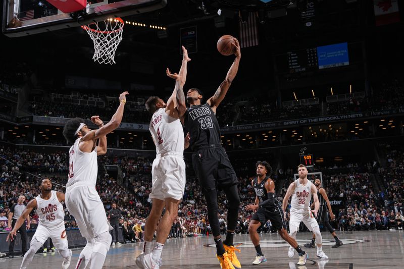 BROOKLYN, NY - FEBRUARY 8: Nicolas Claxton #33 of the Brooklyn Nets drives to the basket during the game against the Cleveland Cavaliers on February 8, 2024 at Barclays Center in Brooklyn, New York. NOTE TO USER: User expressly acknowledges and agrees that, by downloading and or using this Photograph, user is consenting to the terms and conditions of the Getty Images License Agreement. Mandatory Copyright Notice: Copyright 2024 NBAE (Photo by Jesse D. Garrabrant/NBAE via Getty Images)