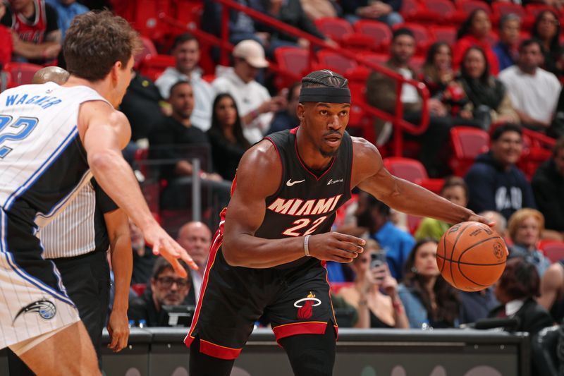 MIAMI, FL - FEBRUARY 6: Jimmy Butler #22 of the Miami Heat dribbles the ball during the game against the Orlando Magic on February 6, 2024 at Kaseya Center in Miami, Florida. NOTE TO USER: User expressly acknowledges and agrees that, by downloading and or using this Photograph, user is consenting to the terms and conditions of the Getty Images License Agreement. Mandatory Copyright Notice: Copyright 2024 NBAE (Photo by Issac Baldizon/NBAE via Getty Images)