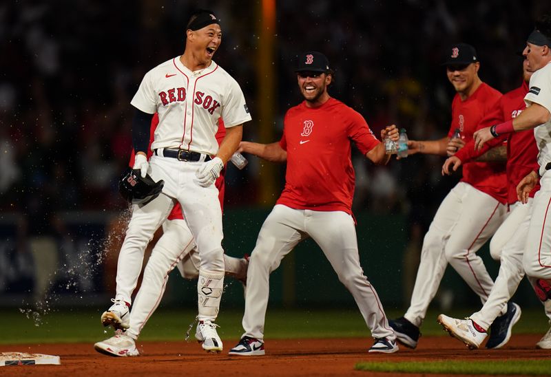 Aug 12, 2024; Boston, Massachusetts, USA; Boston Red Sox left fielder Rob Refsnyder (30) singles to center field to drive in the winning run against the Texas Rangers in the tenth inning at Fenway Park. Mandatory Credit: David Butler II-USA TODAY Sports