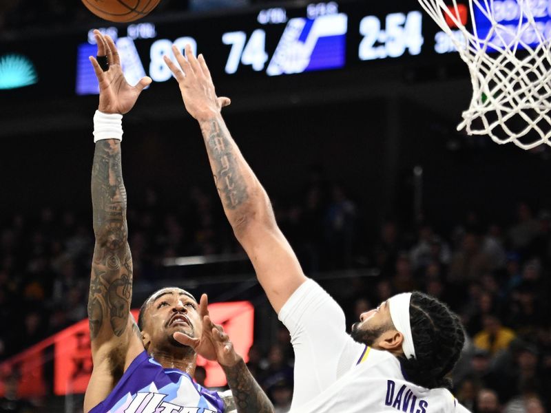 SALT LAKE CITY, UTAH - DECEMBER 01: John Collins #20 of the Utah Jazz shoots over Anthony Davis #3 of the Los Angeles Lakers during the second half at Delta Center on December 01, 2024 in Salt Lake City, Utah. NOTE TO USER: User expressly acknowledges and agrees that, by downloading and or using this photograph, User is consenting to the terms and conditions of the Getty Images License Agreement. (Photo by Alex Goodlett/Getty Images)