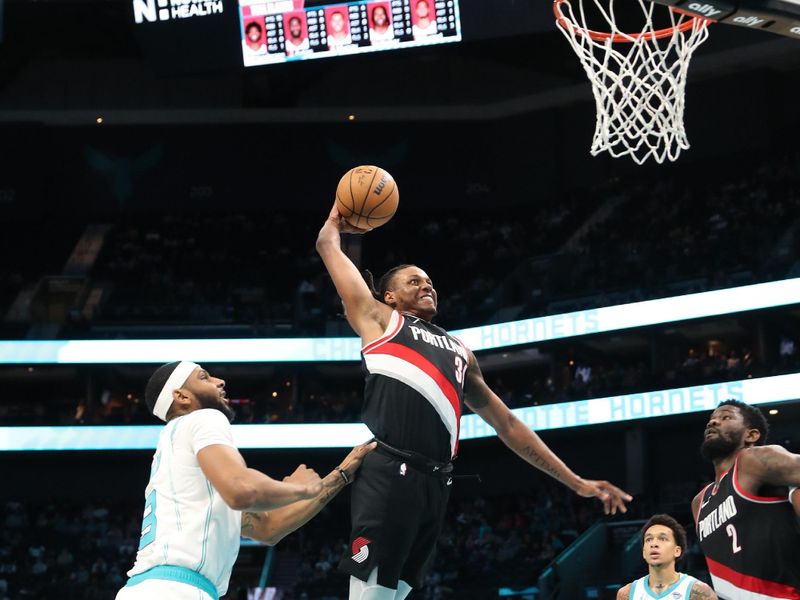 CHARLOTTE, NC - APRIL 3:  Jabari Walker #34 of the Portland Trail Blazers drives to the basket during the game against the Charlotte Hornets on April 3, 2024 at Spectrum Center in Charlotte, North Carolina. NOTE TO USER: User expressly acknowledges and agrees that, by downloading and or using this photograph, User is consenting to the terms and conditions of the Getty Images License Agreement.  Mandatory Copyright Notice:  Copyright 2024 NBAE (Photo by Brock Williams-Smith/NBAE via Getty Images)