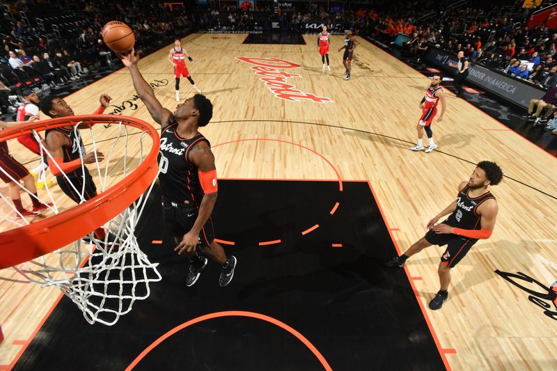 DETROIT, MI - JANUARY 27: Jalen Duren #0 of the Detroit Pistons grabs a rebound during the game against the Washington Wizards on January 27, 2024 at Little Caesars Arena in Detroit, Michigan. NOTE TO USER: User expressly acknowledges and agrees that, by downloading and/or using this photograph, User is consenting to the terms and conditions of the Getty Images License Agreement. Mandatory Copyright Notice: Copyright 2024 NBAE (Photo by Chris Schwegler/NBAE via Getty Images)