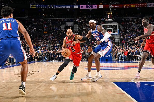 PHILADELPHIA, PA - JANUARY 2: Jevon Carter #5 of the Chicago Bulls dribbles the ball during the game against the Philadelphia 76ers on January 2, 2024 at the Wells Fargo Center in Philadelphia, Pennsylvania NOTE TO USER: User expressly acknowledges and agrees that, by downloading and/or using this Photograph, user is consenting to the terms and conditions of the Getty Images License Agreement. Mandatory Copyright Notice: Copyright 2024 NBAE (Photo by David Dow/NBAE via Getty Images)