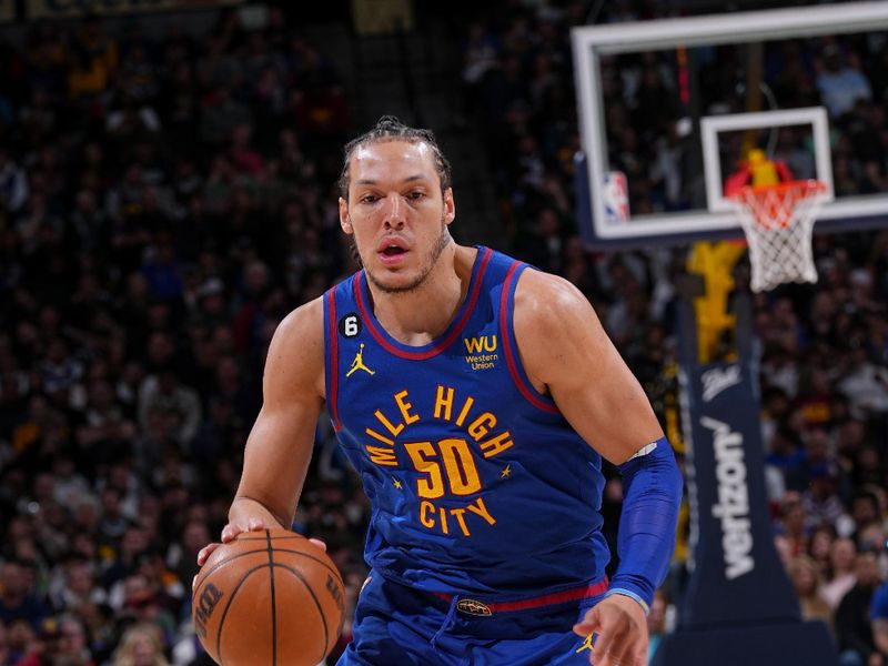 DENVER, CO - MARCH 25: Aaron Gordon #50 of the Denver Nuggets dribbles the ball during the game against the Milwaukee Bucks on March 25, 2023 at the Ball Arena in Denver, Colorado. NOTE TO USER: User expressly acknowledges and agrees that, by downloading and/or using this Photograph, user is consenting to the terms and conditions of the Getty Images License Agreement. Mandatory Copyright Notice: Copyright 2023 NBAE (Photo by Bart Young/NBAE via Getty Images)