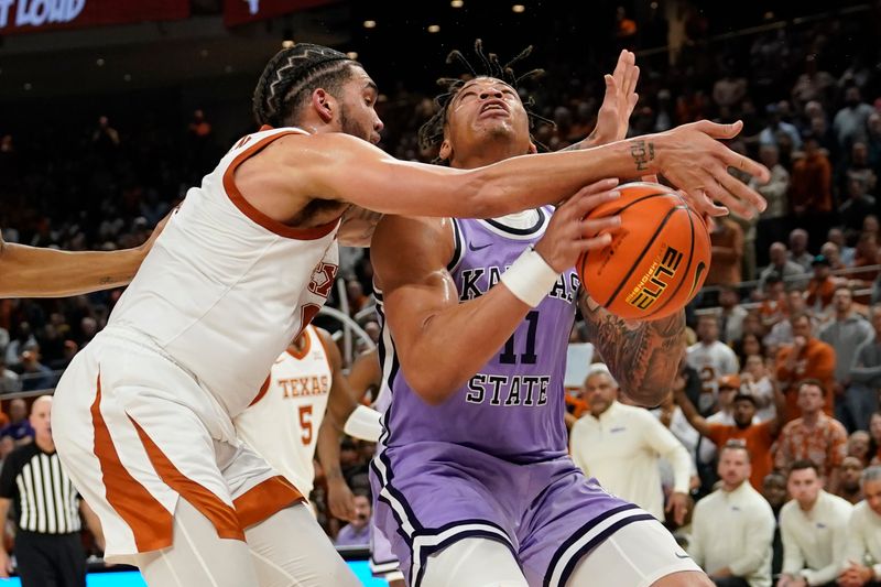 Jan 3, 2023; Austin, Texas, USA; Kansas State Wildcats forward Keyontae Johnson (11) drives to the basket against Texas Longhorns forward Timmy Allen (0) during the second half at Moody Center. Mandatory Credit: Scott Wachter-USA TODAY Sports