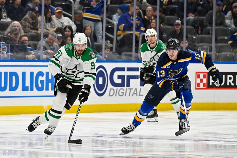 Dec 27, 2023; St. Louis, Missouri, USA;  Dallas Stars center Tyler Seguin (91) controls the puck against the St. Louis Blues during the third period at Enterprise Center. Mandatory Credit: Jeff Curry-USA TODAY Sports