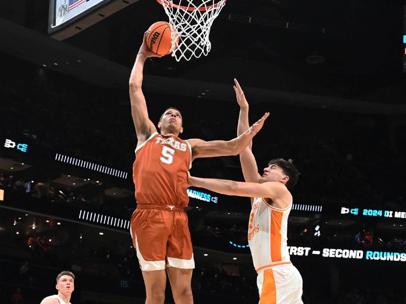 March 23, 2024, Charlotte, NC, USA; Texas Longhorns forward Kadin Shedrick (5) dunks against the Tennessee Volunteers in the second round of the 2024 NCAA Tournament at the Spectrum Center. Mandatory Credit: Bob Donnan-USA TODAY Sports