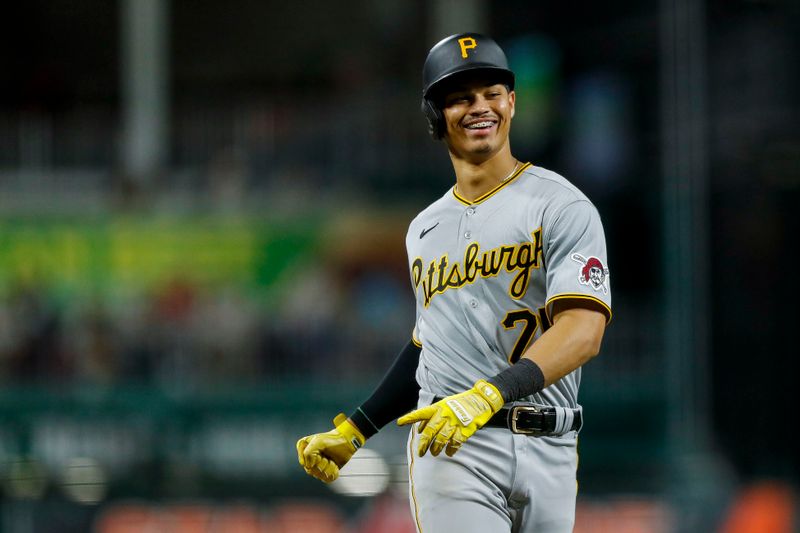 Sep 22, 2023; Cincinnati, Ohio, USA; Pittsburgh Pirates catcher Endy Rodriguez (25) reacts after hitting a solo home run in the sixth inning against the Cincinnati Reds at Great American Ball Park. Mandatory Credit: Katie Stratman-USA TODAY Sports