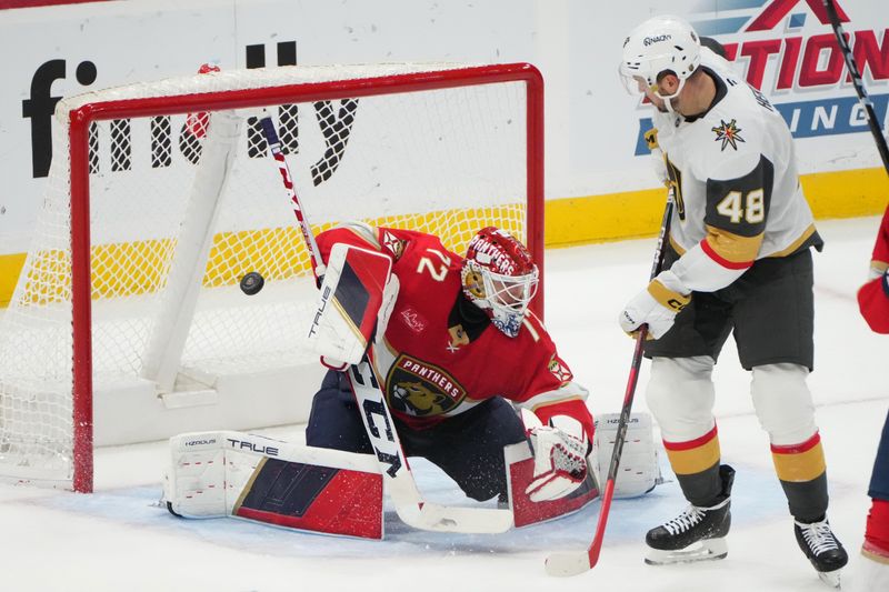 Oct 19, 2024; Sunrise, Florida, USA;  Florida Panthers goaltender Sergei Bobrovsky (72) makes a save off a deflection by Vegas Golden Knights center Tomas Hertl (48) during overtime at Amerant Bank Arena. Mandatory Credit: Jim Rassol-Imagn Images