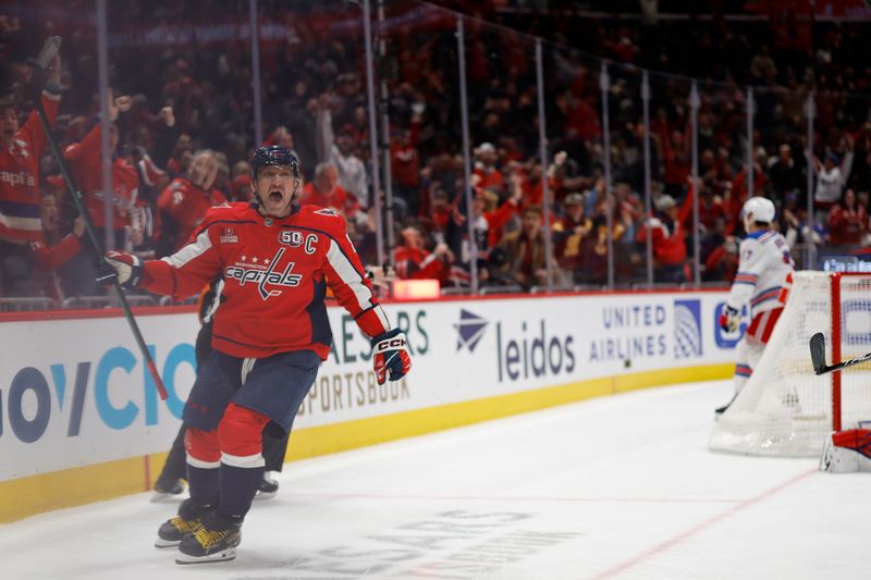 Jan 4, 2025; Washington, District of Columbia, USA; Washington Capitals left wing Alex Ovechkin (8) celebrates after scoring a goal against the New York Rangers in the third period at Capital One Arena. Mandatory Credit: Geoff Burke-Imagn Images
