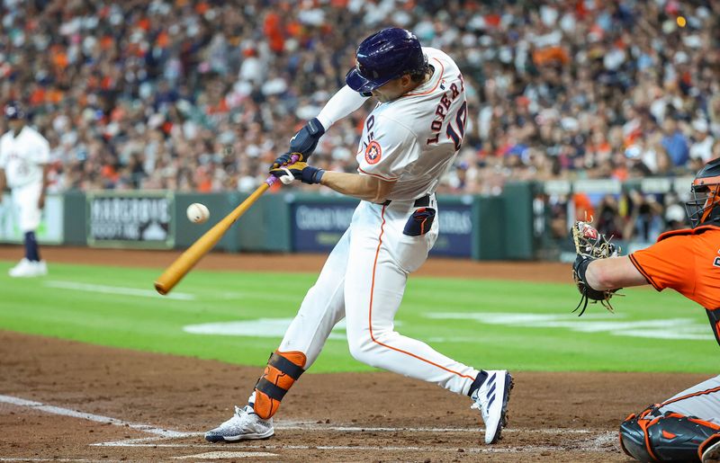 Jun 22, 2024; Houston, Texas, USA; Houston Astros left fielder Joey Loperfido (10) bats during the second inning against the Baltimore Orioles at Minute Maid Park. Mandatory Credit: Troy Taormina-USA TODAY Sports