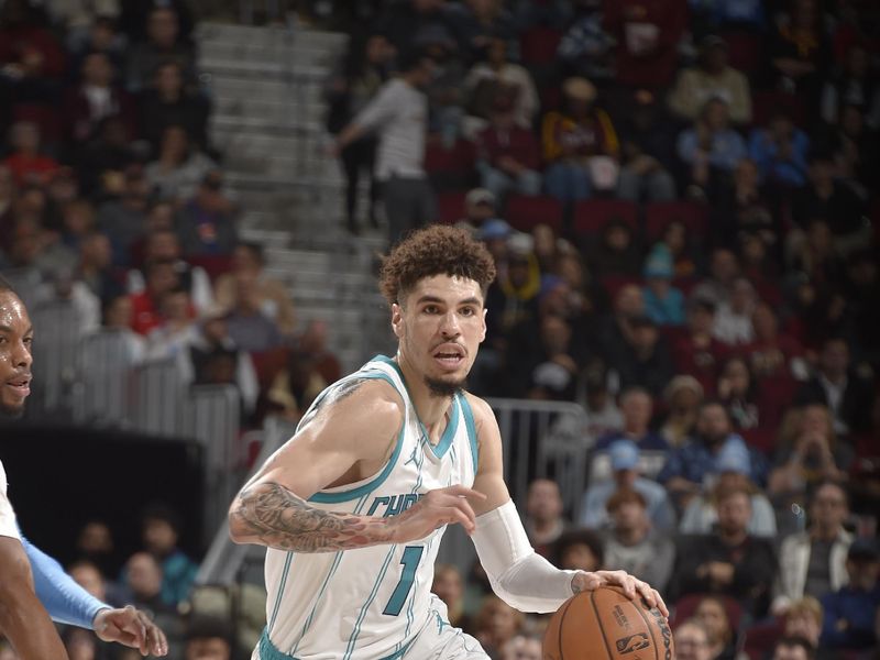 CLEVELAND, OH - NOVEMBER 17: LaMelo Ball #1 of the Charlotte Hornets dribbles the ball during the game against the Cleveland Cavaliers on November 17, 2024 at Rocket Mortgage FieldHouse in Cleveland, Ohio. NOTE TO USER: User expressly acknowledges and agrees that, by downloading and/or using this Photograph, user is consenting to the terms and conditions of the Getty Images License Agreement. Mandatory Copyright Notice: Copyright 2024 NBAE (Photo by David Liam Kyle/NBAE via Getty Images)