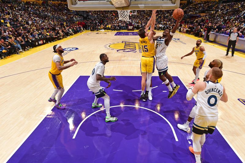 LOS ANGELES, CA - OCTOBER 22: Anthony Edwards #5 of the Minnesota Timberwolves drives to the basket during the game against the Los Angeles Lakers on October 22, 2024 at Crypto.Com Arena in Los Angeles, California. NOTE TO USER: User expressly acknowledges and agrees that, by downloading and/or using this Photograph, user is consenting to the terms and conditions of the Getty Images License Agreement. Mandatory Copyright Notice: Copyright 2024 NBAE (Photo by Adam Pantozzi/NBAE via Getty Images)