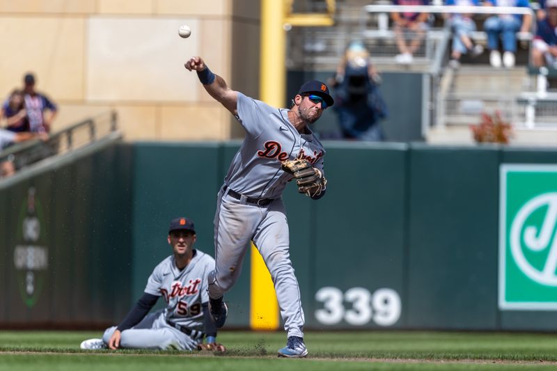 Aug 16, 2023; Minneapolis, Minnesota, USA; Detroit Tigers third baseman Matt Vierling (8) throws the ball to first base for an out against the Minnesota Twins in the eighth inning at Target Field. Mandatory Credit: Jesse Johnson-USA TODAY Sports