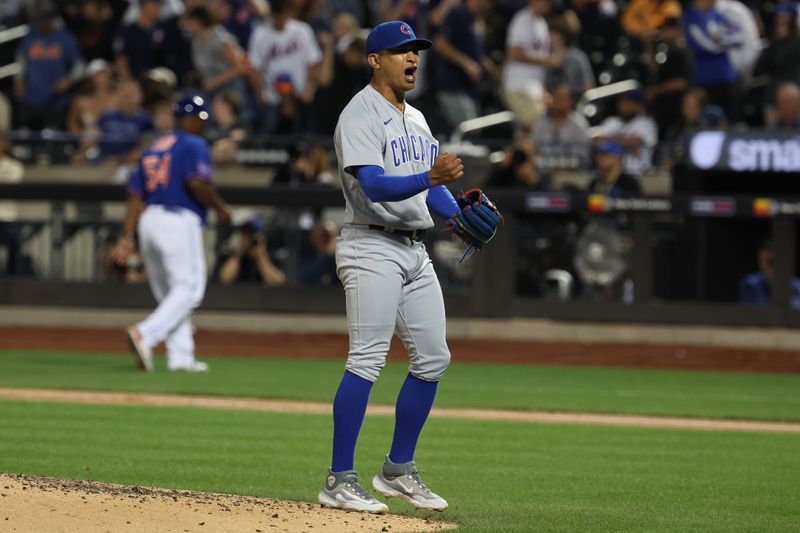 Aug 8, 2023; New York City, New York, USA; Chicago Cubs relief pitcher Adbert Alzolay (73) reacts after closing the game against the New York Mets at Citi Field. Mandatory Credit: Vincent Carchietta-USA TODAY Sports