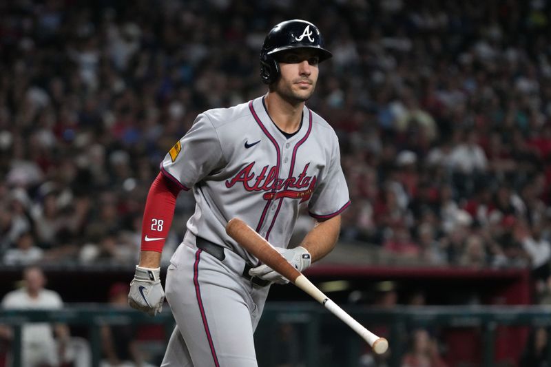 Apr 27, 2025; Phoenix, Arizona, USA; Atlanta Braves first base Matt Olson (28) walks against the Arizona Diamondbacks in the seventh inning at Chase Field. Mandatory Credit: Rick Scuteri-Imagn Images