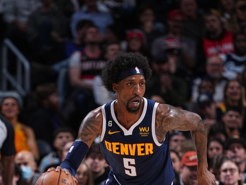 DENVER, CO - JANUARY 17: Kentavious Caldwell-Pope #5 of the Denver Nuggets dribbles the ball during the game against the Portland Trail Blazers on January 17, 2023 at the Ball Arena in Denver, Colorado. NOTE TO USER: User expressly acknowledges and agrees that, by downloading and/or using this Photograph, user is consenting to the terms and conditions of the Getty Images License Agreement. Mandatory Copyright Notice: Copyright 2023 NBAE (Photo by Garrett Ellwood/NBAE via Getty Images)