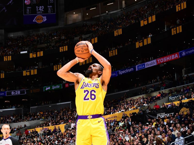 LOS ANGELES, CA - MARCH 18:  Spencer Dinwiddie #26 of the Los Angeles Lakers shoots a 3-point basket during the game  on March 18, 2024 at Crypto.Com Arena in Los Angeles, California. NOTE TO USER: User expressly acknowledges and agrees that, by downloading and/or using this Photograph, user is consenting to the terms and conditions of the Getty Images License Agreement. Mandatory Copyright Notice: Copyright 2024 NBAE (Photo by Adam Pantozzi/NBAE via Getty Images)