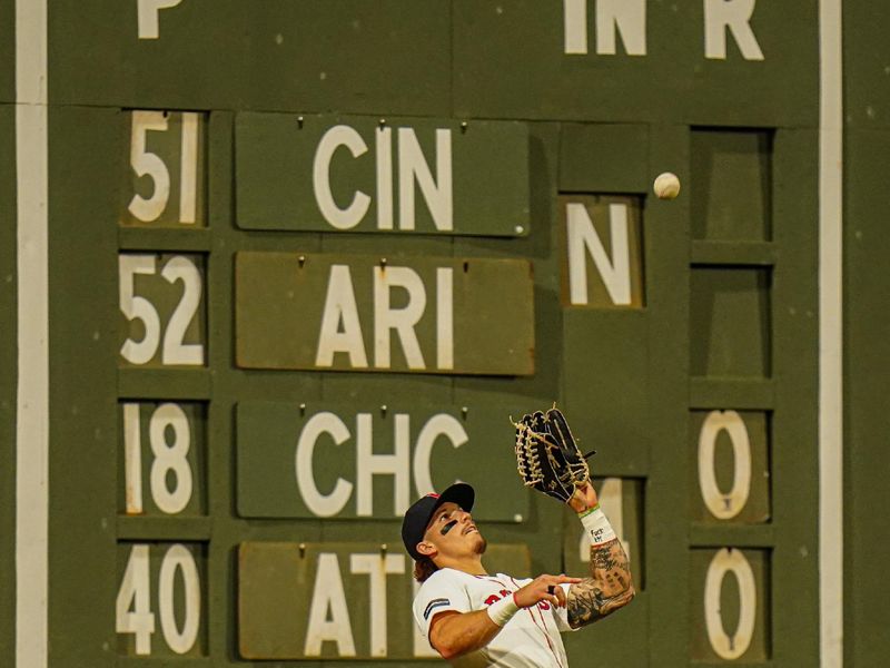 May 13, 2024; Boston, Massachusetts, USA; Boston Red Sox left fielder Jarren Duran (16) makes the play against the Tampa Bay Rays in the forth inning at Fenway Park. Mandatory Credit: David Butler II-USA TODAY Sports